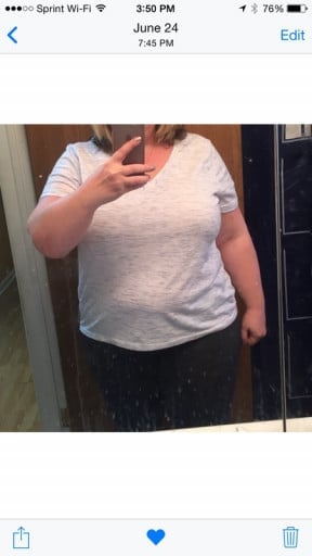 A picture of a 5'7" female showing a weight cut from 261 pounds to 230 pounds. A net loss of 31 pounds.