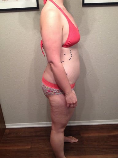 A progress pic of a 5'8" woman showing a snapshot of 183 pounds at a height of 5'8