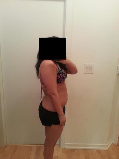 A picture of a 5'2" female showing a snapshot of 157 pounds at a height of 5'2