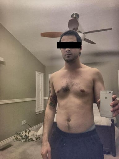 A photo of a 5'10" man showing a weight reduction from 171 pounds to 164 pounds. A total loss of 7 pounds.