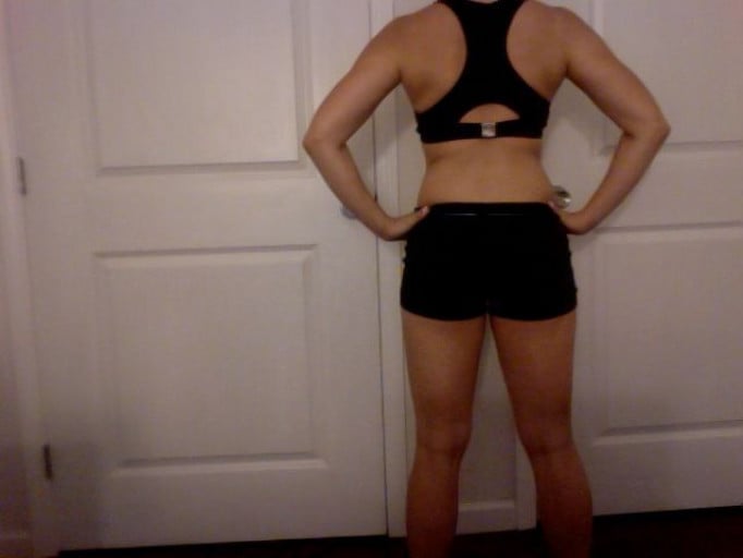 A progress pic of a 5'3" woman showing a snapshot of 128 pounds at a height of 5'3