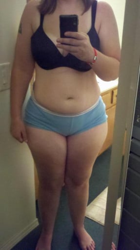 A progress pic of a 5'7" woman showing a snapshot of 202 pounds at a height of 5'7