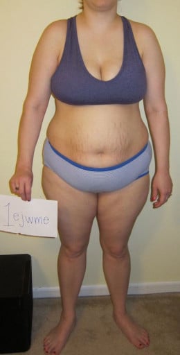 A photo of a 5'4" woman showing a weight reduction from 203 pounds to 166 pounds. A respectable loss of 37 pounds.