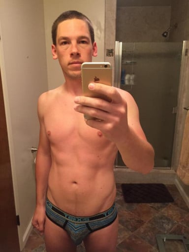 A picture of a 5'11" male showing a weight cut from 193 pounds to 173 pounds. A respectable loss of 20 pounds.