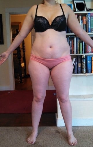 A photo of a 5'8" woman showing a snapshot of 203 pounds at a height of 5'8
