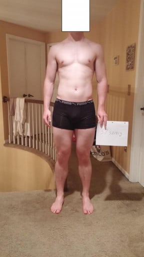 A photo of a 6'3" man showing a snapshot of 215 pounds at a height of 6'3