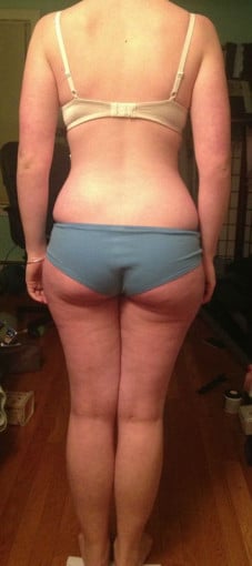 A progress pic of a 5'4" woman showing a snapshot of 129 pounds at a height of 5'4