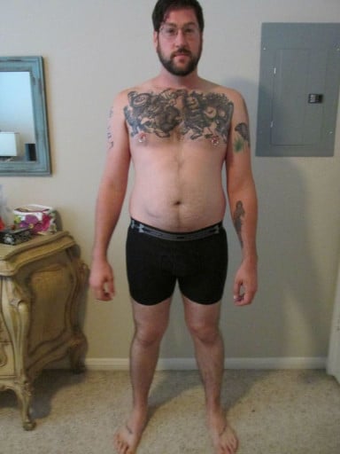 A photo of a 5'11" man showing a snapshot of 215 pounds at a height of 5'11