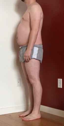 A photo of a 5'9" man showing a snapshot of 187 pounds at a height of 5'9