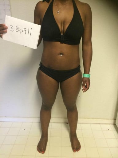 A photo of a 4'9" woman showing a snapshot of 127 pounds at a height of 4'9