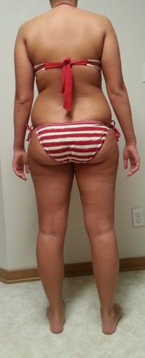 A progress pic of a 5'7" woman showing a snapshot of 166 pounds at a height of 5'7