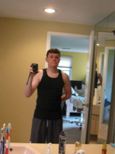 A picture of a 5'7" male showing a weight cut from 215 pounds to 148 pounds. A total loss of 67 pounds.