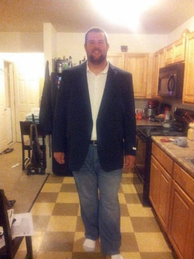 A photo of a 6'6" man showing a weight reduction from 426 pounds to 353 pounds. A respectable loss of 73 pounds.