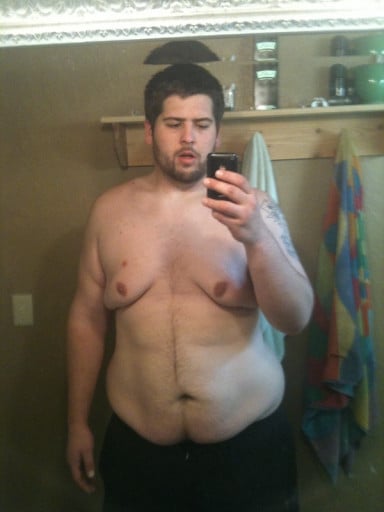 A picture of a 6'6" male showing a fat loss from 375 pounds to 255 pounds. A net loss of 120 pounds.