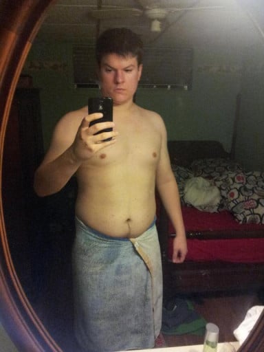 A photo of a 6'2" man showing a weight reduction from 242 pounds to 183 pounds. A total loss of 59 pounds.