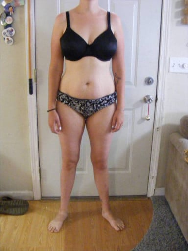 A progress pic of a 5'9" woman showing a snapshot of 165 pounds at a height of 5'9