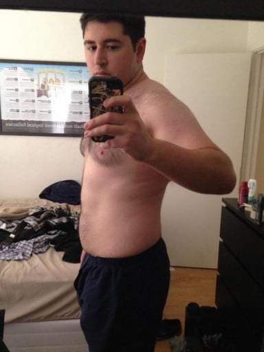A picture of a 6'1" male showing a weight cut from 254 pounds to 235 pounds. A total loss of 19 pounds.