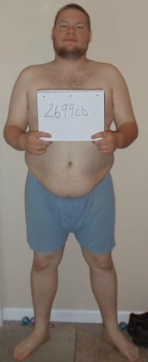 A picture of a 5'9" male showing a snapshot of 238 pounds at a height of 5'9