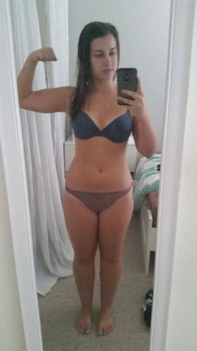 A picture of a 5'4" female showing a fat loss from 168 pounds to 153 pounds. A net loss of 15 pounds.
