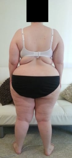 A photo of a 5'3" woman showing a snapshot of 217 pounds at a height of 5'3
