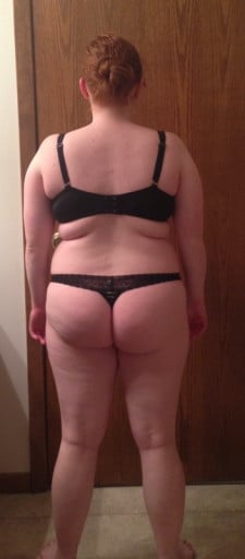 A progress pic of a 5'0" woman showing a snapshot of 154 pounds at a height of 5'0
