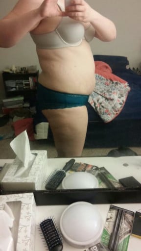 A before and after photo of a 5'11" female showing a fat loss from 250 pounds to 230 pounds. A total loss of 20 pounds.