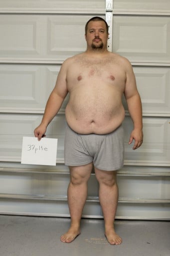 A picture of a 6'0" male showing a snapshot of 329 pounds at a height of 6'0