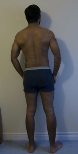 A photo of a 5'9" man showing a snapshot of 155 pounds at a height of 5'9