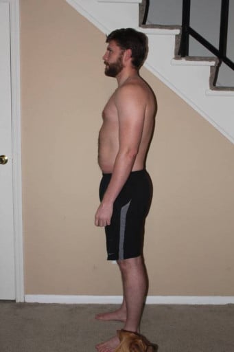 A photo of a 6'2" man showing a snapshot of 214 pounds at a height of 6'2