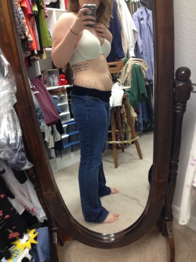 A photo of a 5'0" woman showing a weight cut from 230 pounds to 139 pounds. A total loss of 91 pounds.