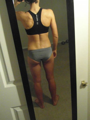 A photo of a 5'7" woman showing a snapshot of 132 pounds at a height of 5'7