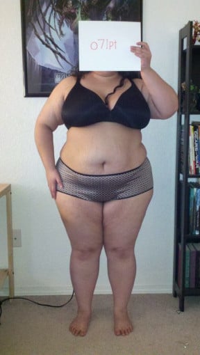 A progress pic of a 5'2" woman showing a snapshot of 275 pounds at a height of 5'2
