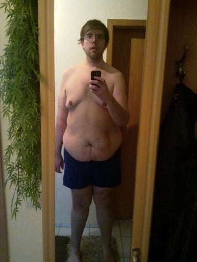 A picture of a 6'4" male showing a weight loss from 498 pounds to 283 pounds. A total loss of 215 pounds.