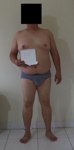 A picture of a 5'6" male showing a snapshot of 208 pounds at a height of 5'6