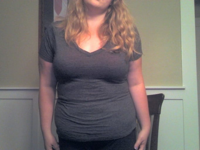 A photo of a 5'8" woman showing a weight loss from 310 pounds to 167 pounds. A net loss of 143 pounds.