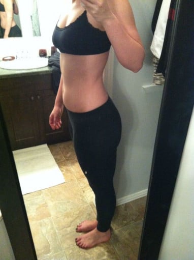 A photo of a 5'9" woman showing a weight cut from 175 pounds to 155 pounds. A respectable loss of 20 pounds.
