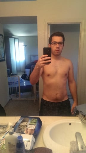 A picture of a 5'6" male showing a weight cut from 215 pounds to 150 pounds. A total loss of 65 pounds.