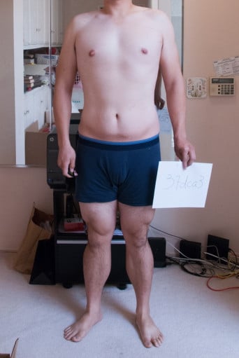 A progress pic of a 6'2" man showing a snapshot of 231 pounds at a height of 6'2