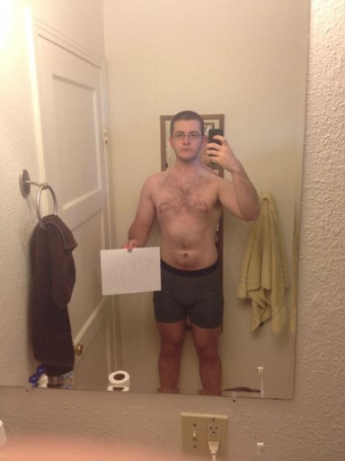 A photo of a 6'0" man showing a snapshot of 187 pounds at a height of 6'0