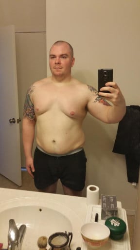 A before and after photo of a 5'11" male showing a weight reduction from 315 pounds to 240 pounds. A net loss of 75 pounds.