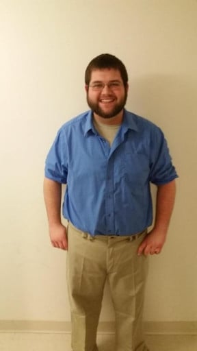 A picture of a 5'11" male showing a weight reduction from 335 pounds to 275 pounds. A net loss of 60 pounds.