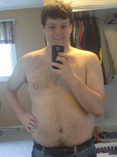 A photo of a 5'11" man showing a fat loss from 225 pounds to 155 pounds. A total loss of 70 pounds.