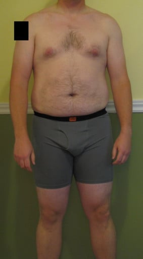 A progress pic of a 5'10" man showing a snapshot of 215 pounds at a height of 5'10