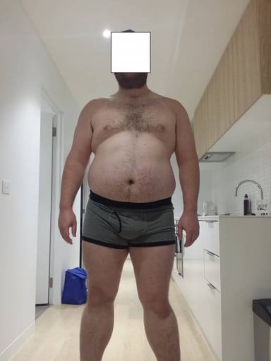 A progress pic of a 6'1" man showing a snapshot of 297 pounds at a height of 6'1