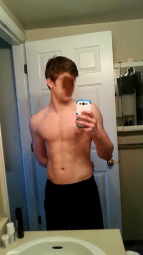 A picture of a 5'11" male showing a muscle gain from 122 pounds to 153 pounds. A respectable gain of 31 pounds.
