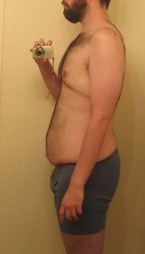A progress pic of a 6'2" man showing a snapshot of 208 pounds at a height of 6'2