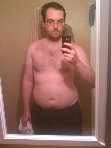 A picture of a 6'2" male showing a weight reduction from 250 pounds to 190 pounds. A net loss of 60 pounds.
