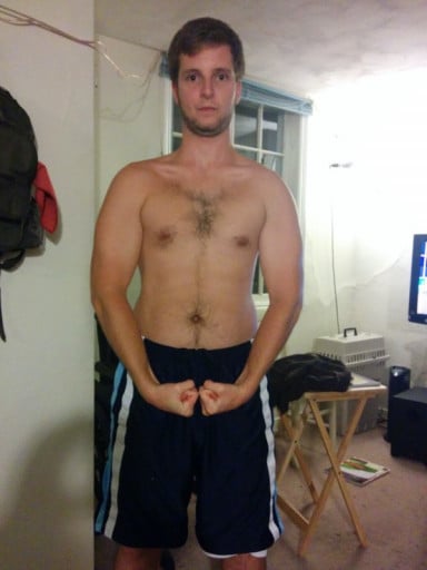 A photo of a 5'8" man showing a muscle gain from 120 pounds to 155 pounds. A respectable gain of 35 pounds.