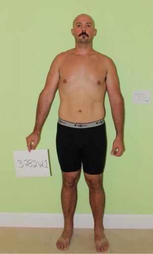 A photo of a 6'2" man showing a snapshot of 214 pounds at a height of 6'2