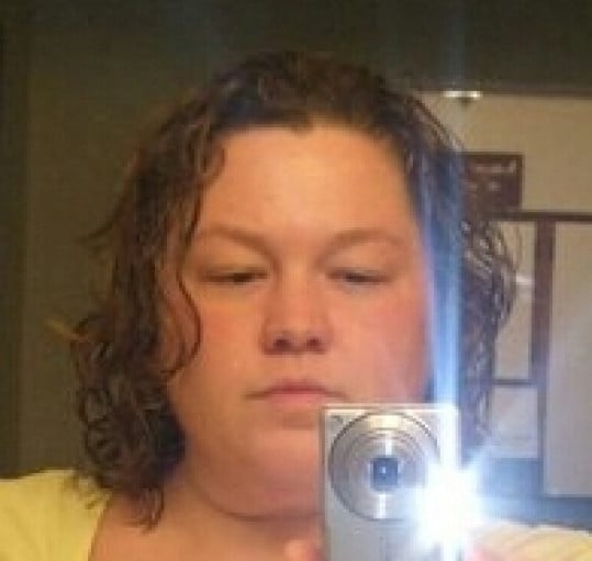A picture of a 5'8" female showing a weight loss from 309 pounds to 192 pounds. A total loss of 117 pounds.